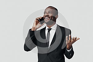 Happy young African man in formalwear