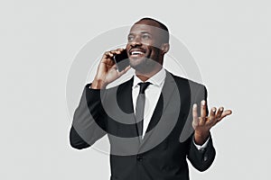 Happy young African man in formalwear photo