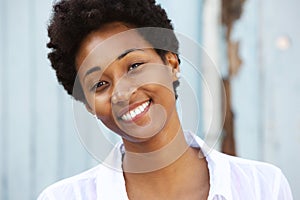 Happy young african woman with beautiful smile