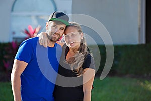 Happy young american couple with first home