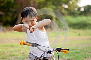 Happy young asia boy playing kungfu having fun