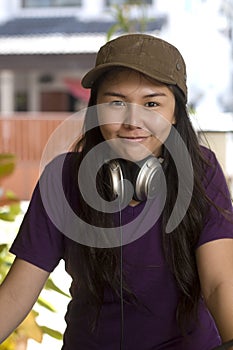 Happy young Asian girl with funny smile