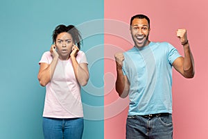 Happy young black man shouting loud, celebrating victory, scared woman closing her ears with fingers, shocked with noise