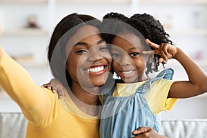 Happy Young Black Mother Taking Selfie With Little Daughter At Home, Pov