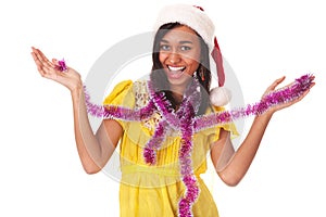 Happy young black woman in christmas cap