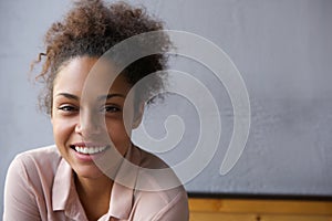 Happy young black woman smiling