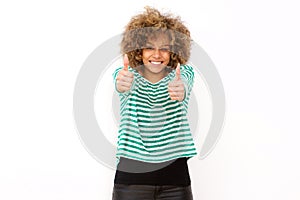 Happy young black woman smiling with thumbs up hand sign