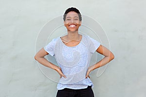 Happy young black woman in t-shirt