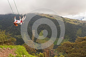 Happy Young Blonde Woman Swinging