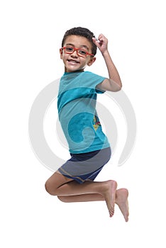 Happy Young Boy Jumping in The Air