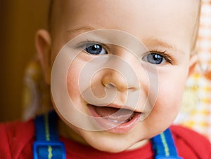 Happy young boy smiling