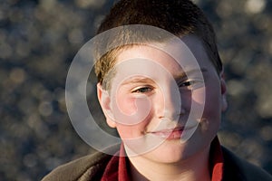 Happy young boy smiling