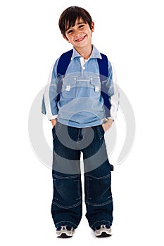 Happy young boy smiling at camera