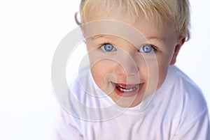 Happy young boy on white background