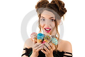 Happy young brunette with ice cream in hands