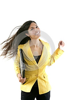 Happy young brunette student with yellow jacket