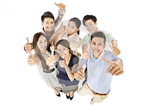 Happy young business team with thumbs up gesture