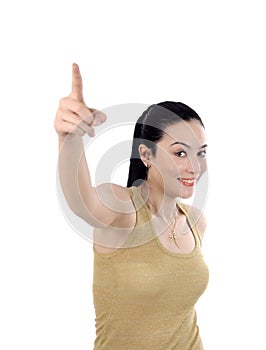 Happy young business woman pointing upwards