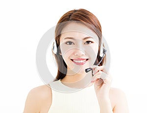 Happy young business woman wearing headset