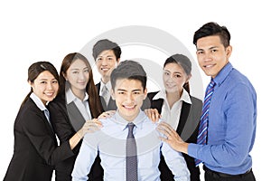 Happy Young businessman with Business team