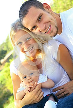 Happy Young Caucasian Family Enjoying Outdoor