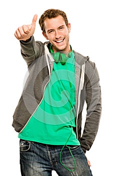 Happy young caucasian man giving thumbs up sign white background