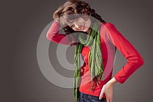 Happy Young Caucasian Woman with Long Green Scarf Portrait. Over