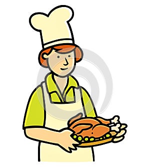 Happy young chef man standing with a dish of fried chicken