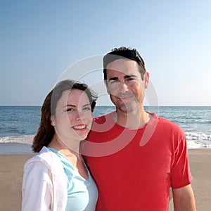 Happy Young Couple On Beach