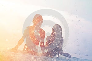 Happy young couple on the beach