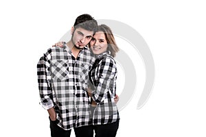 Happy young couple embracing each other isolated on white