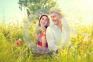 Happy young couple enjoying nature