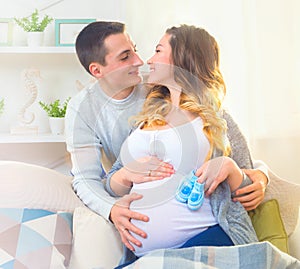 Happy young couple expecting baby