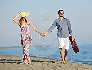 Happy young couple have romantic time on beach