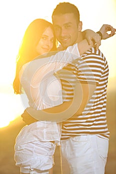 Happy young couple have romantic time on beach