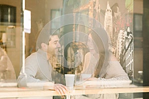 A happy young couple having a romantic moment in an urban setting in West Village in NYC