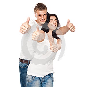 Happy young couple with his thump up. Focus On hands