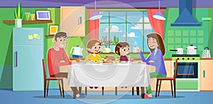 A happy young couple with kids having a meal at home in their kitchen at noon