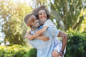 Happy young couple laughing and having fun