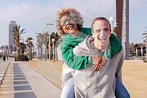 Happy young couple laughing and having fun