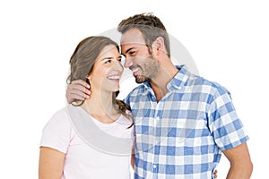 Happy young couple looking at each other and smiling