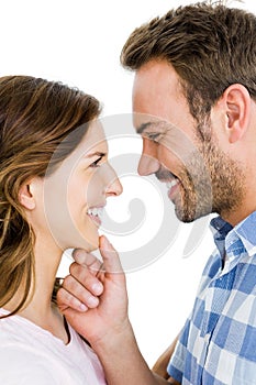 Happy young couple looking at each other and smiling