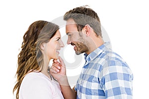 Happy young couple looking at each other and smiling