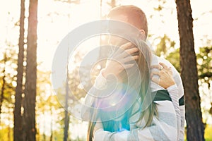 Happy young couple in love hugging. Park outdoors date. Loving couple