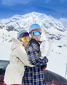 Happy young couple in mountains