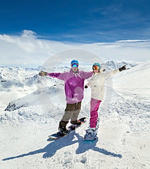 Happy young couple in mountains