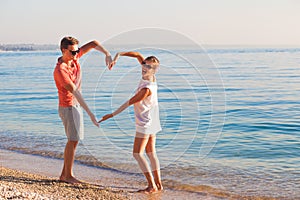 Happy young couple relaxing at Garda lake. Italy, Europe