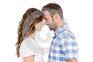 Happy young couple rubbing nose