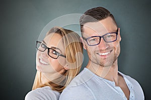 Happy Couple With Stylish Eyeglasses photo