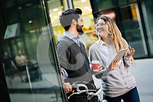 Happy young couple using a digital tablet together and smiling